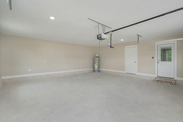 1517 Kais St, Baker, FL 32531 - garage with water heater, baseboards, a garage door opener, and recessed lighting