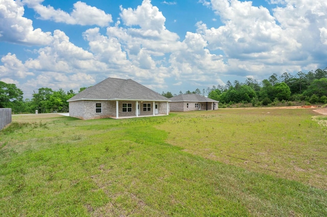 1517 Kais St, Baker, FL 32531 - back of property featuring a yard