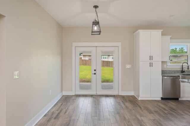 5390 Aidan St, Baker, FL 32531 - doorway to outside featuring a sink, plenty of natural light, wood finished floors, and french doors