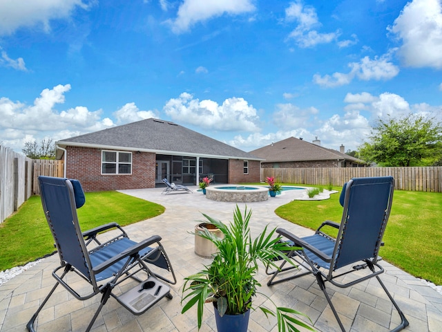 view of patio / terrace featuring a sunroom, a fenced backyard, a fenced in pool, and an in ground hot tub