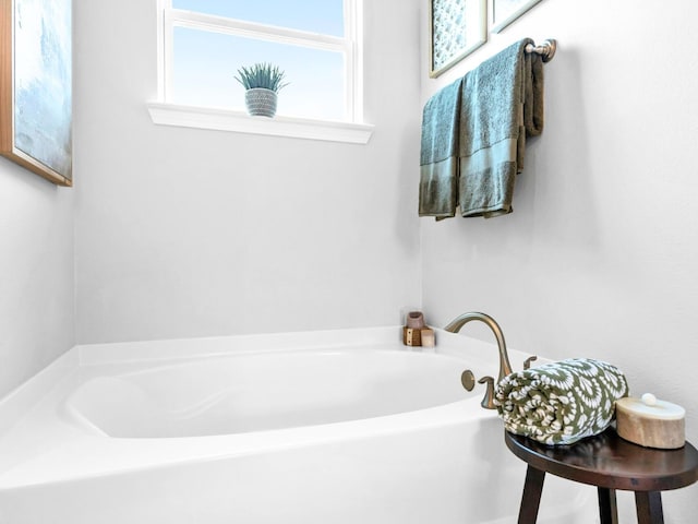 full bath with a bath