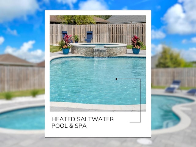 view of pool featuring a fenced backyard, an in ground hot tub, and a fenced in pool