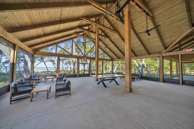 view of patio / terrace featuring glass enclosure