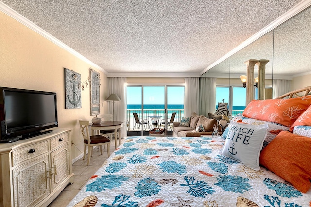 790 Santa Rosa Blvd Unit 304, Fort Walton Beach, FL 32548 - bedroom featuring access to exterior, crown molding, a textured ceiling, light tile patterned floors, and a water view