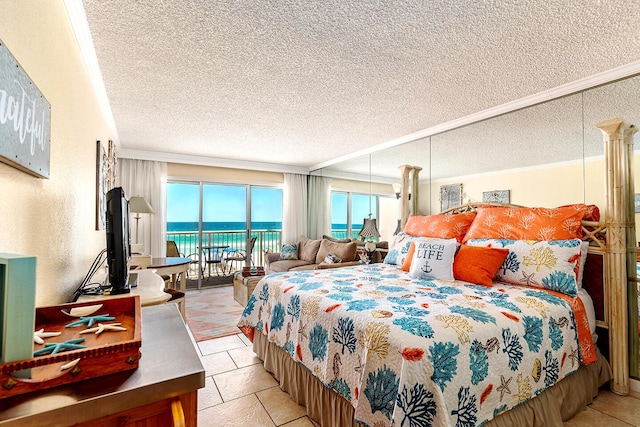 790 Santa Rosa Blvd Unit 304, Fort Walton Beach, FL 32548 - bedroom featuring access to exterior, a textured wall, and a textured ceiling