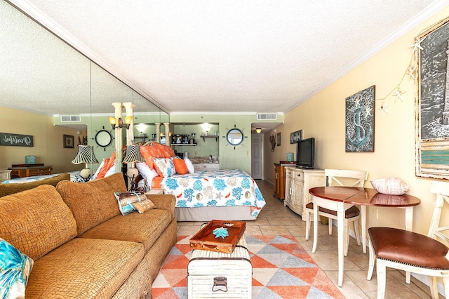 790 Santa Rosa Blvd Unit 304, Fort Walton Beach, FL 32548 - bedroom featuring crown molding, a textured ceiling, and visible vents