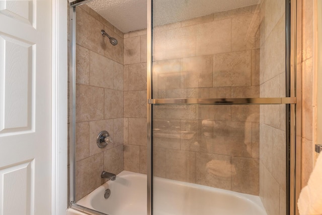 790 Santa Rosa Blvd Unit 304, Fort Walton Beach, FL 32548 - full bathroom featuring enclosed tub / shower combo and a textured ceiling