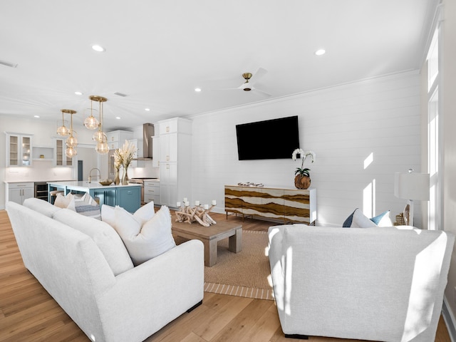 375 Morgans Trl, Santa Rosa Beach, FL 32459 - living room with light wood finished floors, beverage cooler, recessed lighting, and a ceiling fan