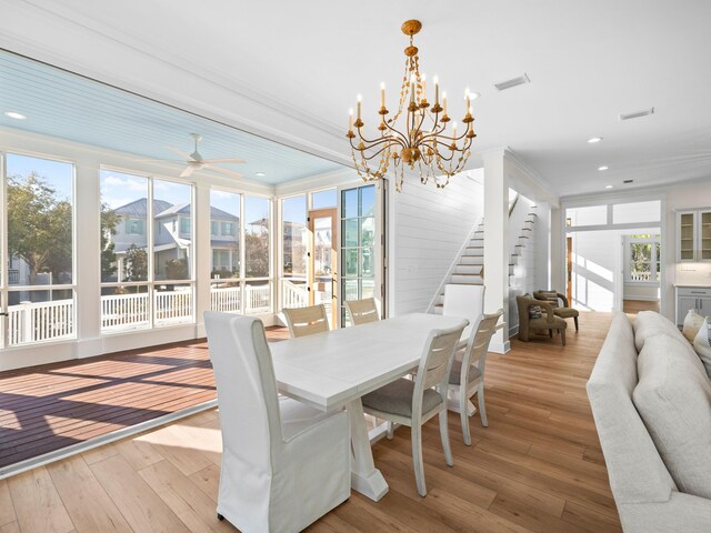 375 Morgans Trl, Santa Rosa Beach, FL 32459 - dining space featuring a wealth of natural light, visible vents, stairway, and hardwood / wood-style floors