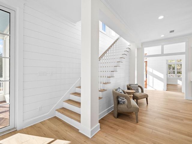 375 Morgans Trl, Santa Rosa Beach, FL 32459 - stairway with visible vents, wood walls, ornamental molding, recessed lighting, and wood-type flooring