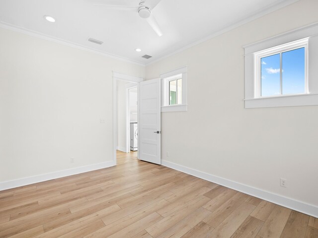 375 Morgans Trl, Santa Rosa Beach, FL 32459 - unfurnished room featuring baseboards, crown molding, light wood-style floors, and visible vents