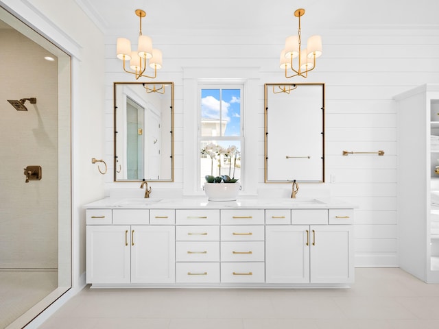 375 Morgans Trl, Santa Rosa Beach, FL 32459 - bathroom featuring a sink, tiled shower, and a chandelier
