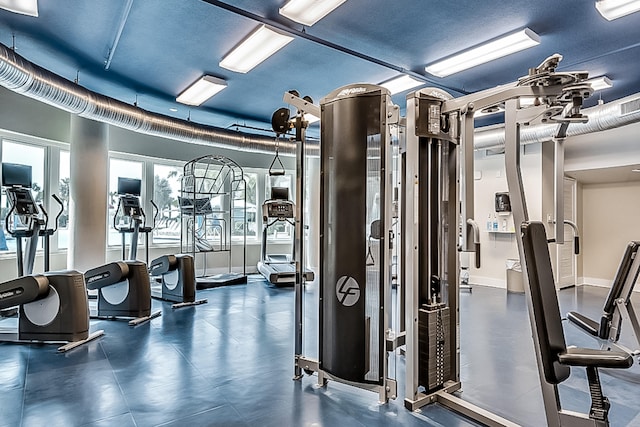gym featuring visible vents and baseboards