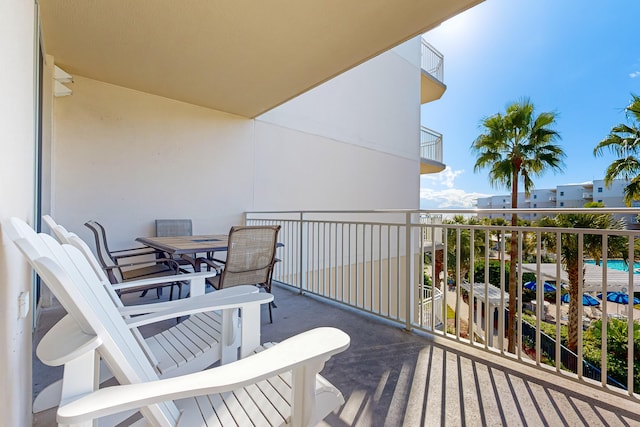 balcony featuring outdoor dining space