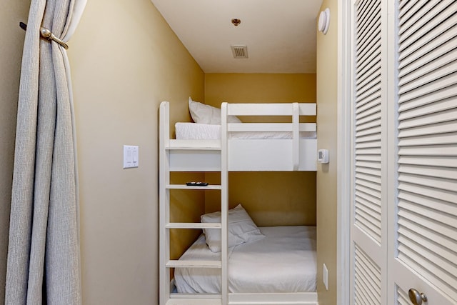 unfurnished bedroom with visible vents