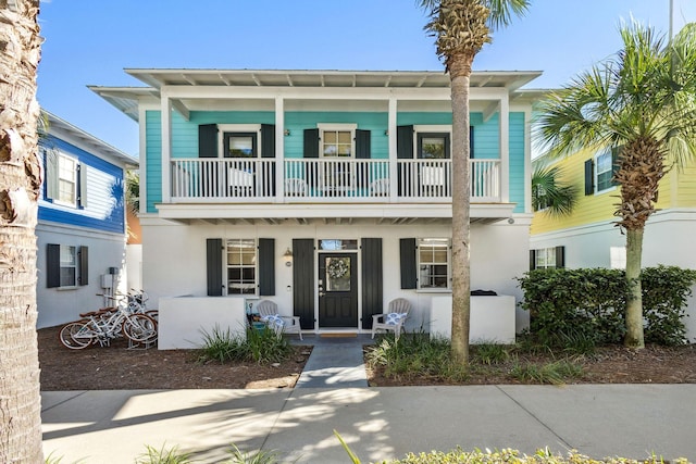 198 Somerset Bridge Rd Unit 120, Santa Rosa Beach, FL 32459 - view of front of house with a porch and a balcony