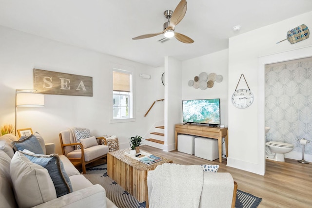 198 Somerset Bridge Rd Unit 120, Santa Rosa Beach, FL 32459 - living area with stairway, baseboards, a ceiling fan, and wood finished floors