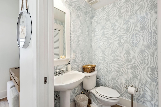 198 Somerset Bridge Rd Unit 120, Santa Rosa Beach, FL 32459 - half bath featuring a sink, visible vents, and toilet