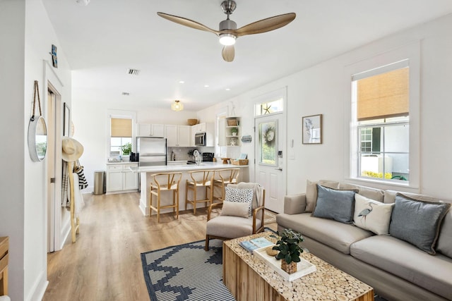 198 Somerset Bridge Rd Unit 120, Santa Rosa Beach, FL 32459 - living area featuring a ceiling fan and light wood finished floors