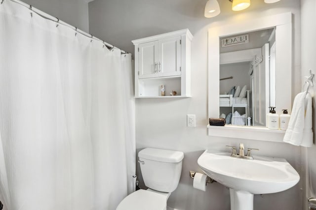 198 Somerset Bridge Rd Unit 120, Santa Rosa Beach, FL 32459 - bathroom with a shower with curtain, toilet, and a sink