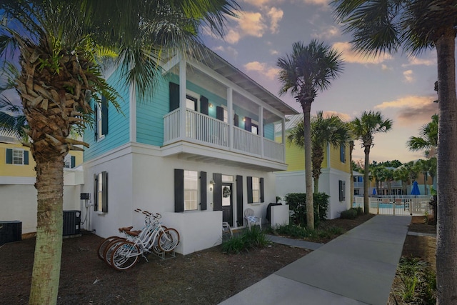 198 Somerset Bridge Rd Unit 120, Santa Rosa Beach, FL 32459 - view of building exterior with cooling unit and fence