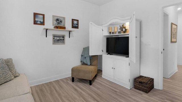 33 Spoonbill Rd, Santa Rosa Beach, FL 32459 - sitting room featuring baseboards and light wood-type flooring