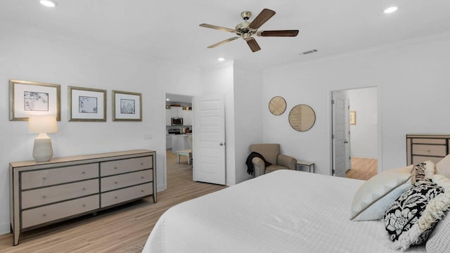 33 Spoonbill Rd, Santa Rosa Beach, FL 32459 - bedroom with a ceiling fan, wood finished floors, visible vents, recessed lighting, and crown molding
