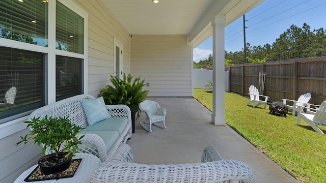 33 Spoonbill Rd, Santa Rosa Beach, FL 32459 - view of patio / terrace with an outdoor living space with a fire pit and fence
