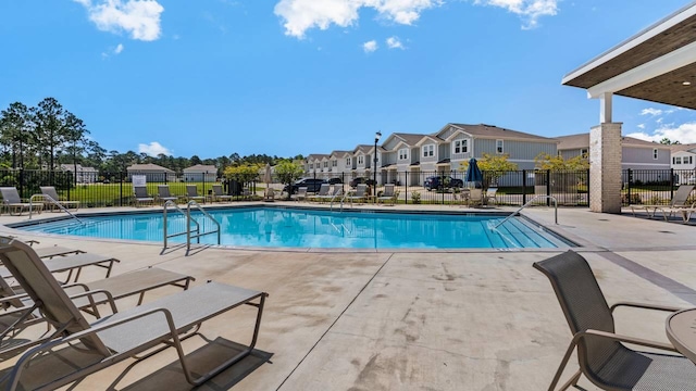 33 Spoonbill Rd, Santa Rosa Beach, FL 32459 - community pool featuring a residential view, a patio, and fence
