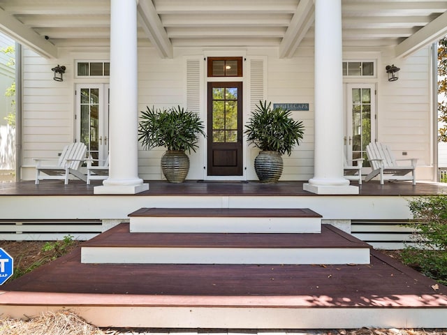 223 Western Lake Dr, Santa Rosa Beach, FL 32459 - property entrance featuring covered porch and french doors