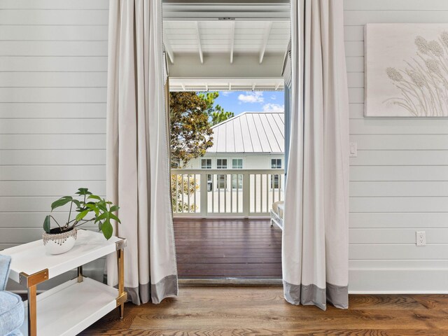 223 Western Lake Dr, Santa Rosa Beach, FL 32459 - doorway featuring wooden walls and wood finished floors