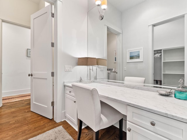 223 Western Lake Dr, Santa Rosa Beach, FL 32459 - bathroom featuring separate washer and dryer, wood finished floors, and vanity