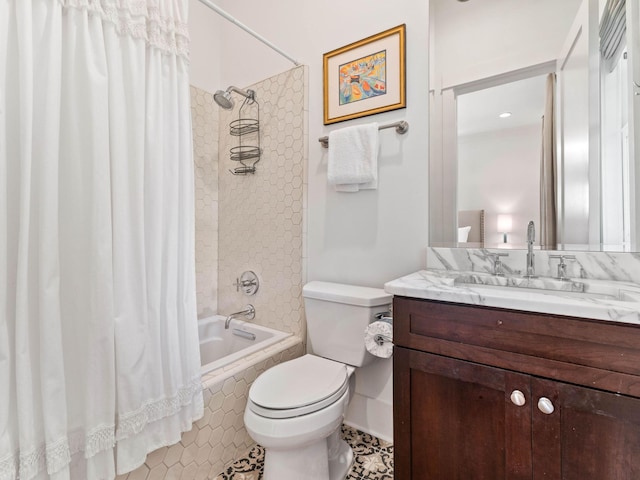 223 Western Lake Dr, Santa Rosa Beach, FL 32459 - full bathroom with toilet, tiled shower / bath combo, tile patterned flooring, and vanity