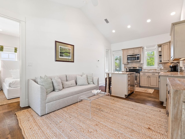 223 Western Lake Dr, Santa Rosa Beach, FL 32459 - living room with visible vents, high vaulted ceiling, recessed lighting, and dark wood-style flooring
