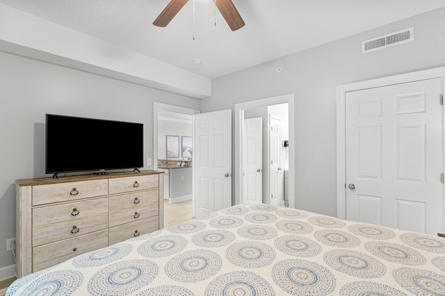 bedroom with visible vents and a ceiling fan