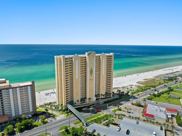 bird's eye view with a beach view and a water view
