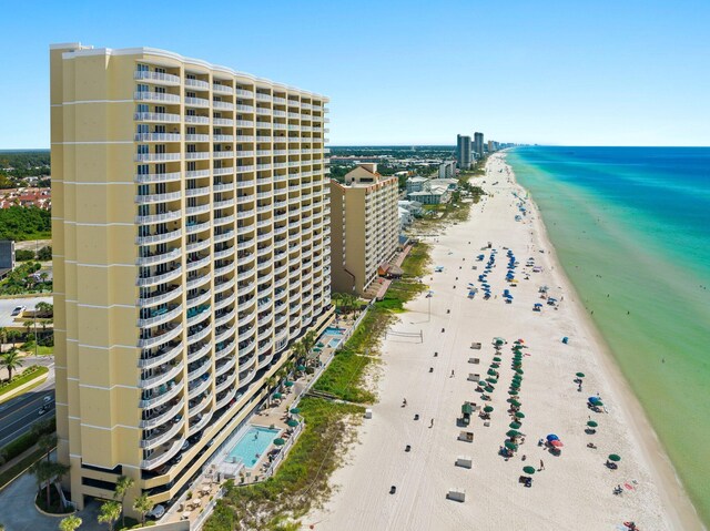 aerial view with a water view, a city view, and a view of the beach