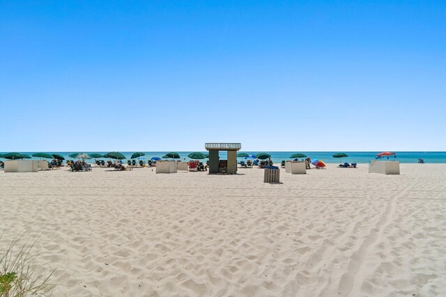 property view of water with a beach view