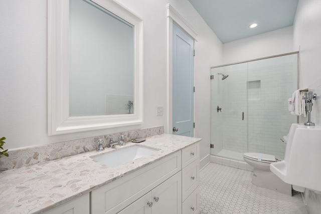 full bath featuring vanity, recessed lighting, a shower stall, tile patterned floors, and toilet