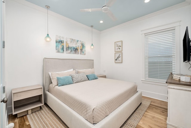 bedroom featuring recessed lighting, wood finished floors, baseboards, and ceiling fan