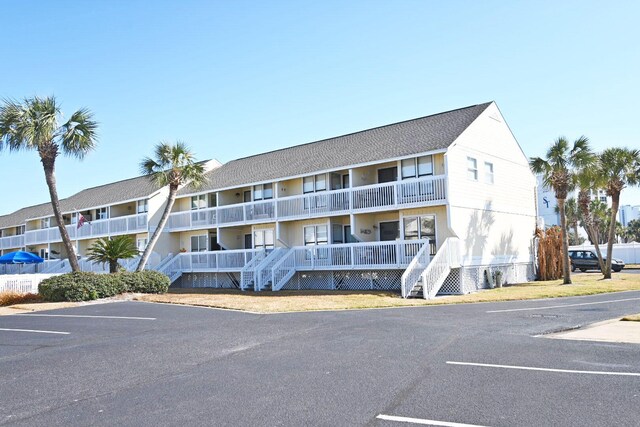 775 Gulf Shore Dr Unit 8108, Destin, FL 32541 - view of property with stairway and uncovered parking