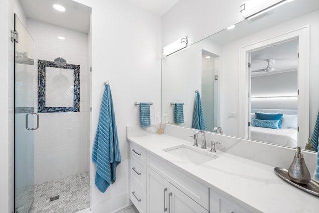 ensuite bathroom with ensuite bath, a stall shower, recessed lighting, and vanity