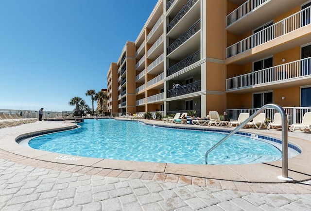 pool featuring a patio area