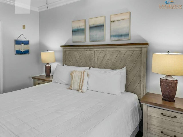 bedroom featuring crown molding