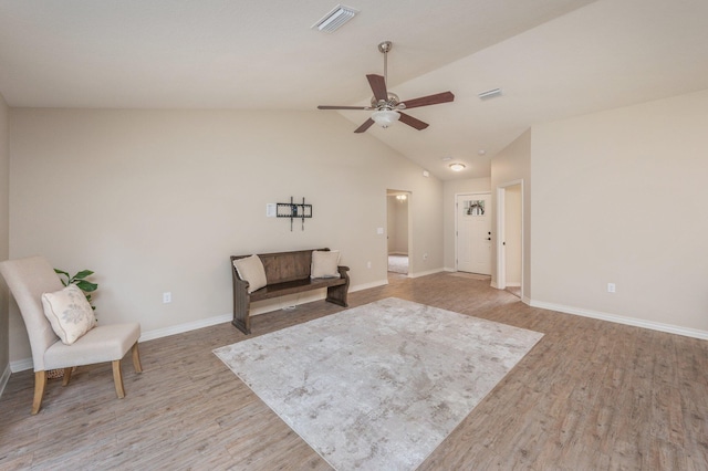 3362 Peeble Dr, Crestview, FL 32539 - living area featuring light wood-style flooring, a ceiling fan, baseboards, and vaulted ceiling