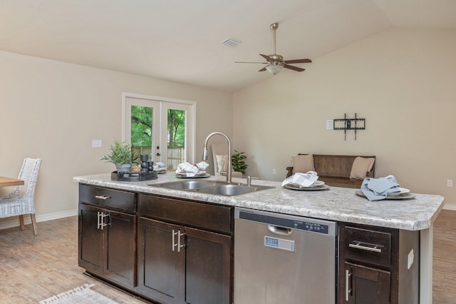 3362 Peeble Dr, Crestview, FL 32539 - kitchen featuring stainless steel dishwasher, a sink, light wood-style floors, ceiling fan, and vaulted ceiling