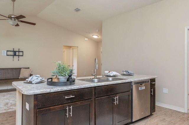 3362 Peeble Dr, Crestview, FL 32539 - kitchen with dishwasher, a sink, light wood-style flooring, ceiling fan, and lofted ceiling