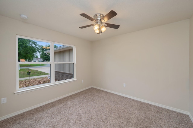 3362 Peeble Dr, Crestview, FL 32539 - carpeted spare room featuring baseboards and a ceiling fan