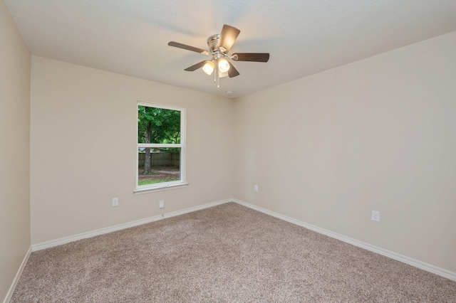 3362 Peeble Dr, Crestview, FL 32539 - spare room with carpet flooring, ceiling fan, and baseboards
