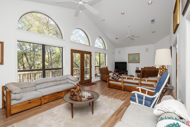 446 Marion Dr, Niceville, FL 32578 - living area with wood finished floors, visible vents, a ceiling fan, french doors, and high vaulted ceiling